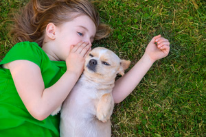 Girl-Whispering-to-dog