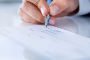 photo of a check being signed